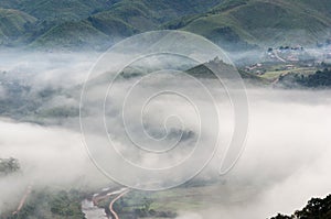 Village in the mist in the winter.