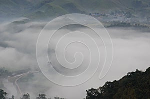 Village in the mist in the winter.