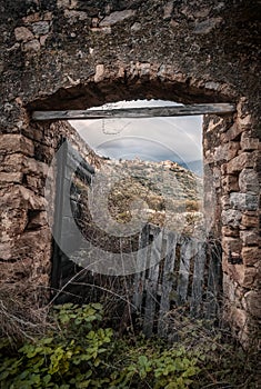 Village of Montemaggiore in Corsica through gate