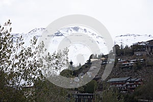 Village in the mountain  Farellones in Chile between the mountains and white merry christmas