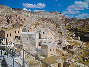 Village in mountain landscape, cappadocia, Turkey photo