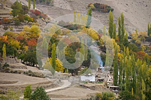 Village near Hoper Glacier in autumn, Pakistan photo