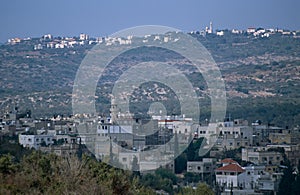 A village in Palestine and an Israeli settlement.