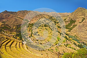 Village of Pisac and inca agricultural terraces. Cusco, Peru