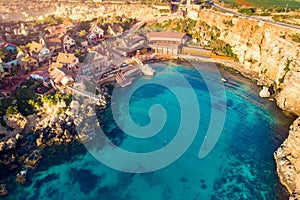 Village Popeye bay panorama Malta sunset. Aerial top view