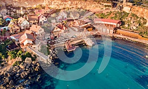 Village Popeye bay panorama Malta sunset, Il-Mellieha. Aerial top view