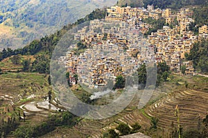 Village, rice fields, paddy terraces in Yunnan province China