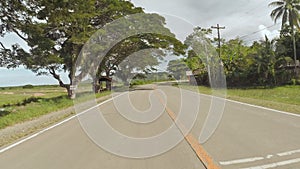 Village Road. Motion on motorbike. Philippines. Bohol island.