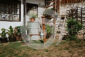 Village rustic garden with water pump