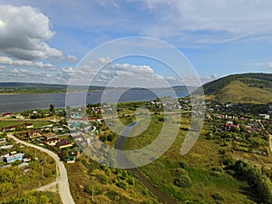 The village of Shiryaevo on the banks of the Volga River from a bird`s eye view.