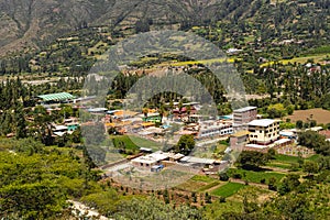 The village of Shupluy, view from a hill. Full of houses, surrounded by diverse vegetation and close to the river Santa