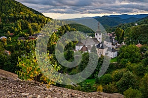 Village Spania Dolina. Fall in Slovakia. Old mining village. Historic church in Spania dolina.