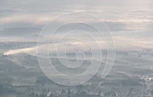 Village in surrounded by fog