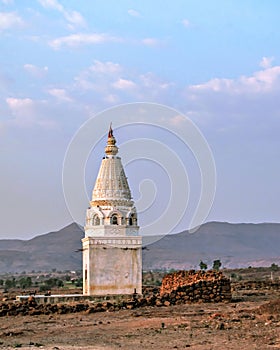Isolated image of a small temple outside Tarde village in Pune district of Maharashtra, India. photo