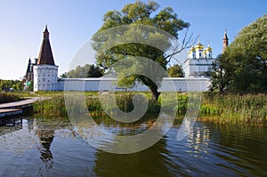 Village Teryaevo, Volokolamsk district, Moscow region, Russia - September, 2020:  Iosifo-Volotsky monastery, view from the lake