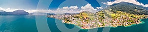 Village Weggis, lake Lucerne Vierwaldstatersee, Rigi mountain and Swiss Alps in the background near famous Lucerne city, Switzer