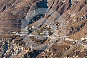 Village and winding road on the mountainside