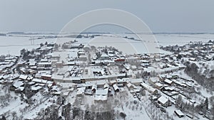 Village winter frost snow drone aerial magic snowy icing ice Bolelouc snowfall. Hana houses scenery cottage and garden