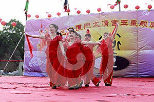 Villagers dancing to celebrate the completion of taiqing palace