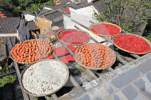 Villagers drying agricultural products, adobe rgb