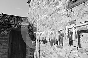 Villagers drying corn, black and white image