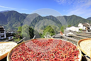 Villagers drys agricultural product under huangling mountain, adobe rgb