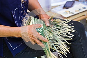 The villagers took bamboo stripes to weave into different forms for daily use utensils of the communityâ€™s people
