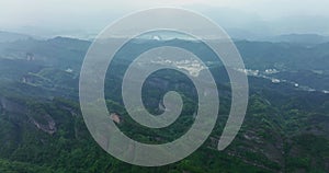 The villages in the distance loomed, Around  Danxia Landform, in Cloudy Day