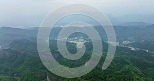 The villages in the distance loomed, Around Danxia Landform, in Cloudy Day