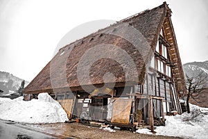 Villages of Shirakawago and Gokayama are one of Japan's UNESCO World Heritage Sites. Farm house in the village and mountain behin