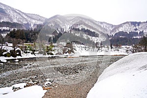 Villages of Shirakawago and Gokayama are one of Japan`s UNESCO World Heritage Sites. Farm house in the village and mountain behin