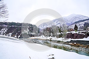 Villages of Shirakawago and Gokayama are one of Japan`s UNESCO World Heritage Sites. Farm house in the village and mountain behin