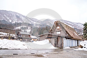 Villages of Shirakawago and Gokayama are one of Japan's UNESCO World Heritage Sites. Farm house in the village and mountain behin