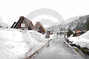 Villages of Shirakawago and Gokayama are one of Japan's UNESCO World Heritage Sites. Farm house in the village and mountain behin