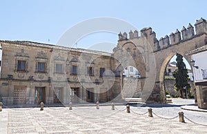 Villalar arc and Jaen gate, Populo square, Baeza, Jaen, Spain photo