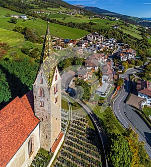 Villandro, Italy - Aerial view of the tower of the Church of St.Michael at the small village of Villandro Villanders at summer