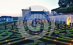 VILLANDRY CASTLE, FRANCE - JULY 07, 2017: The garden illuminated by 2,000 candles at dusk . Nights of a Thousand Lights at