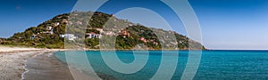 Villas on hill near crystal clear mediterranean sea. Sardinia, Italy