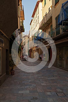 Villefranche-sur-Mer, France, 6 March, 2023: Rue du Poilu street of Villefranche-sur-Mer in the Alpes-Maritimes