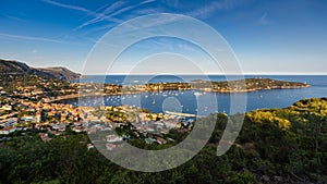 Villefranche-sur-Mer and Saint-Jean-Cap-Ferrat in Summer at sunset. French Riviera, Provence-Alpes-Cote-d`Azur, France photo