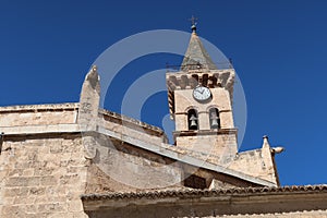 Bell tower and gargoyles of the Santiago Apostol church in Villena, Alicante, Spain photo