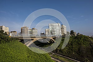 The Villena Rey Bridge in Miraflores district in Lima,- luxury building and ocean pacific Peru. Panoramic view