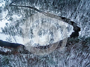 Vilnius, Lithuania: aerial top view of Vilnele river and Belmontas park in winter