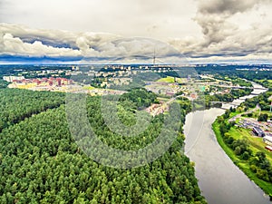 Vilnius, Lithuania: aerial UAV top view of Neris river and park in Bukciai