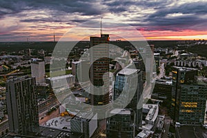 VILNIUS, LITHUANIA - JUNE 2022: Beautiful aerial night view of Vilnius business district with scenic nightime illumination