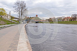 Vilnius, Lithuania . Panoramic view of the riverside and Gediminas Tower visible in distance.