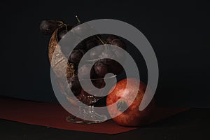 Vinegar, glasses vase, fruit