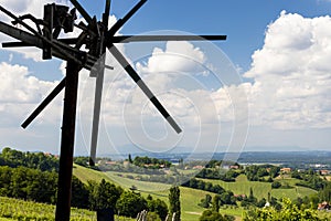 vineyard with windmill called klapotetz in south of Styria, Austria