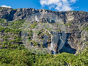 Vinnufossen, a beautiful waterfall flushing down a mountainside in Sunndal, Norway