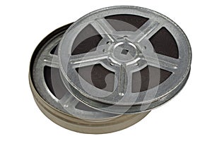 Vintage 16mm film reels and cine-film on white background isolated on white